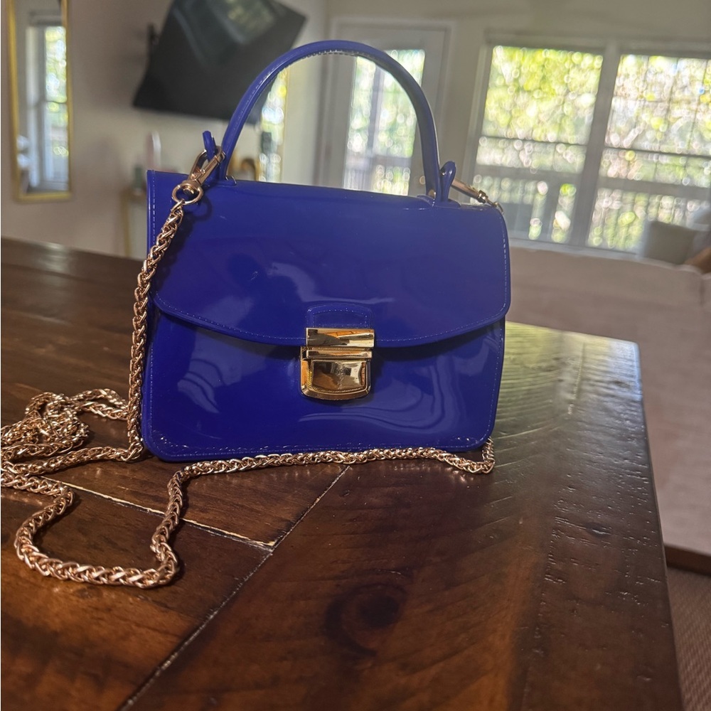 Elegant Blue Patent Leather Handbag with Gold Chain